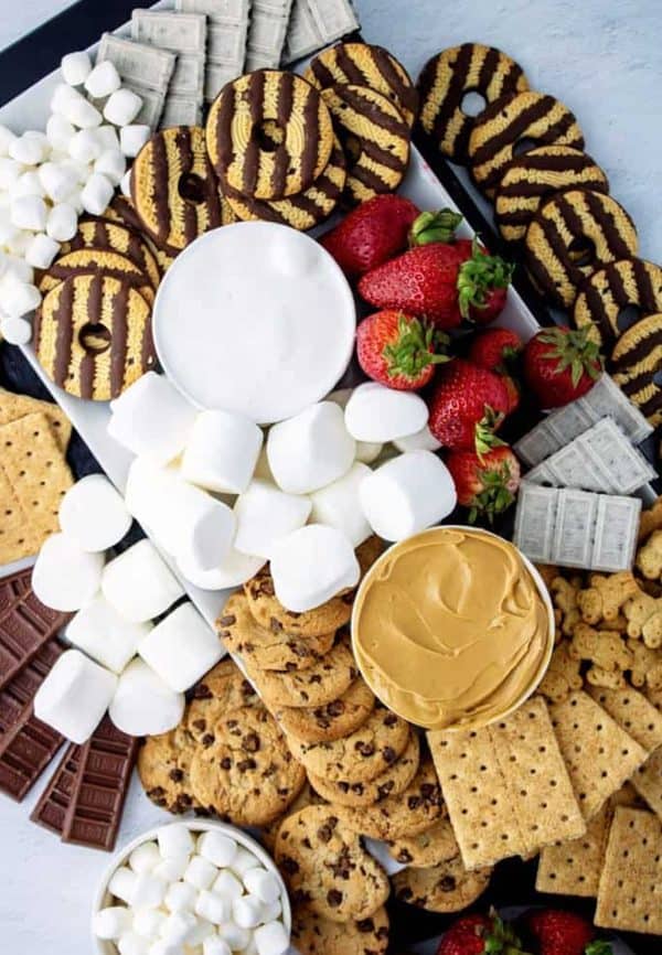 Organized Island put together. Cookies, chocolate, marshmallows, and fruit with a the perfect marshmallow dip