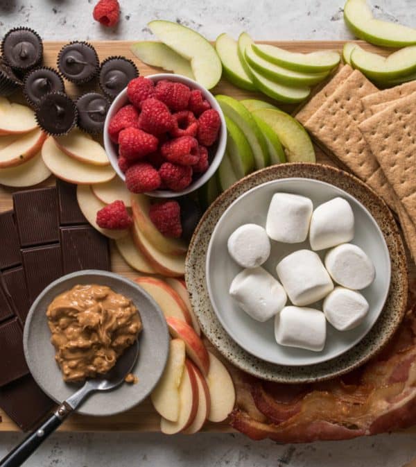 apples, berries, marshmallows and a delicious peanut butter make up a great s'more charcuterie board from Waaple.