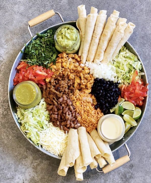 soft tacos with chicken, rice, beans. veggies, and more from Living in yellow.