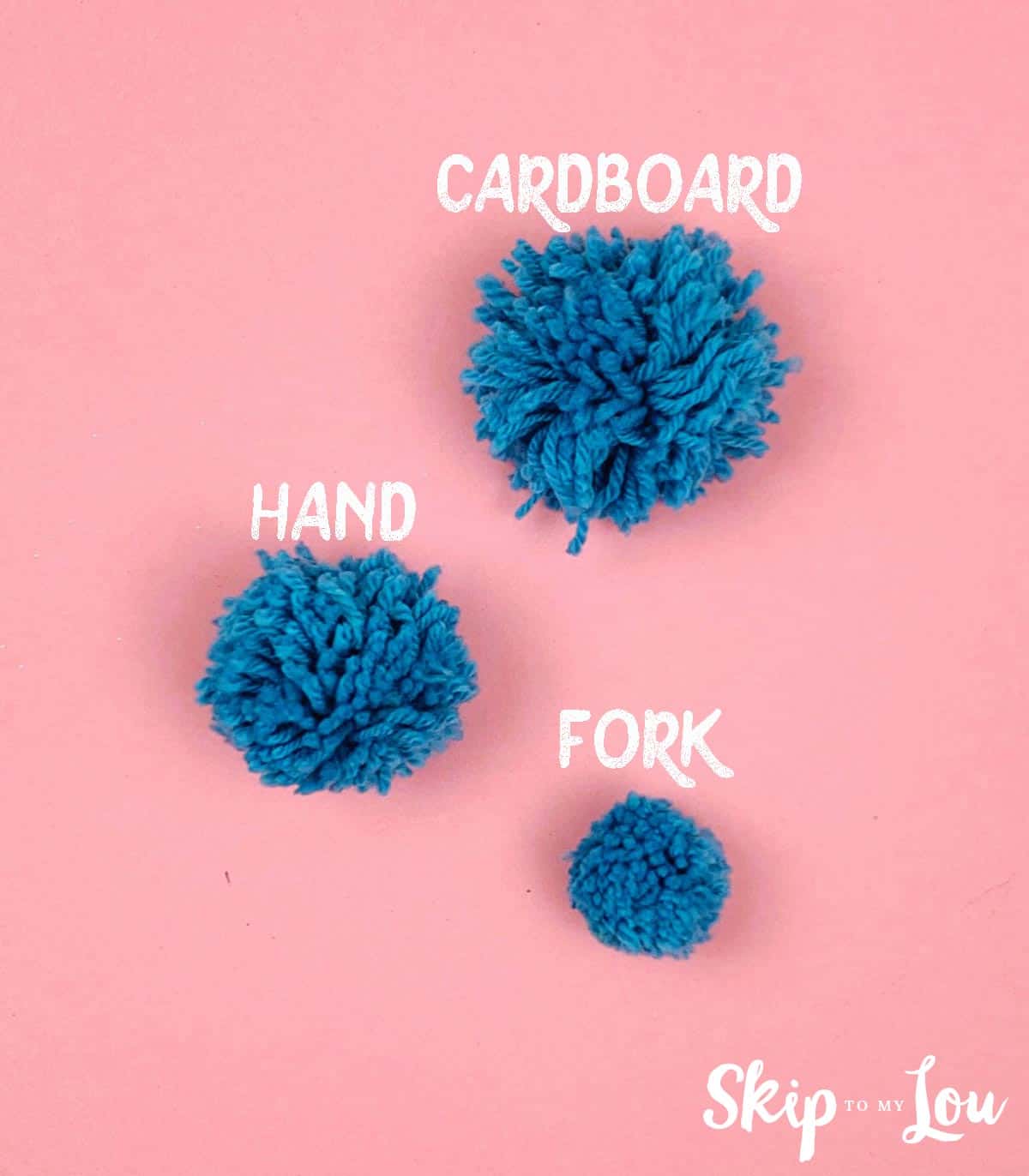 Three pom poms in different sizes made with blue yarn with text that reads "cardboard", "hand" and "fork"