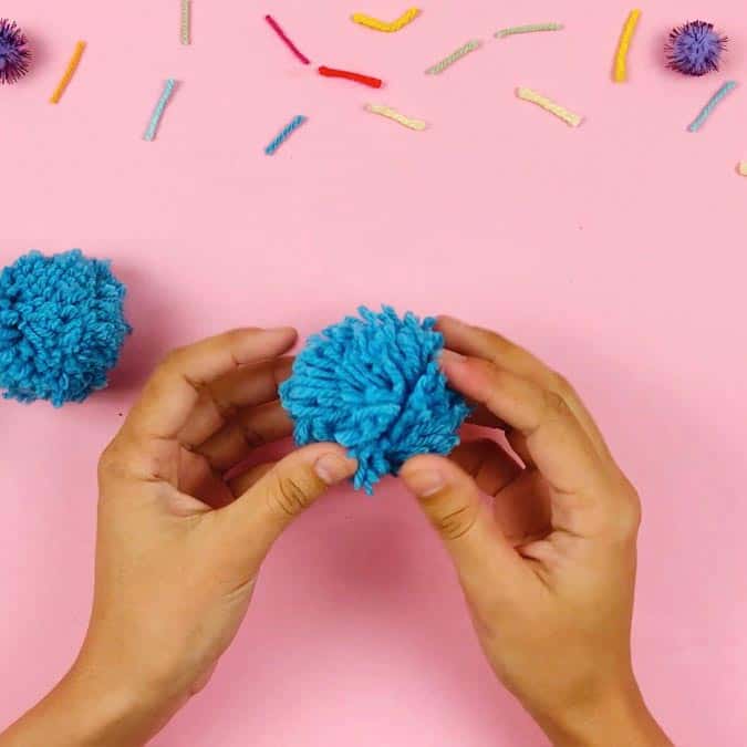 pom pom made from fingers