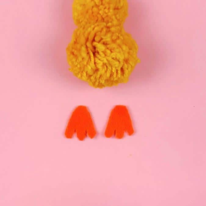 two orange felt feet