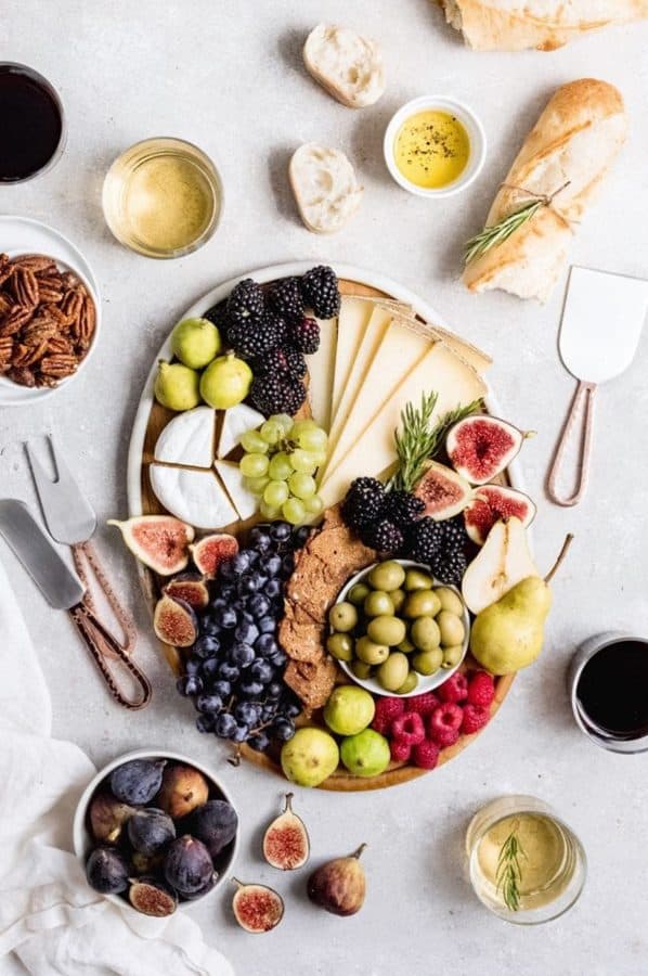 bread, olives, fruit, and cheese board from aint too proud to meg