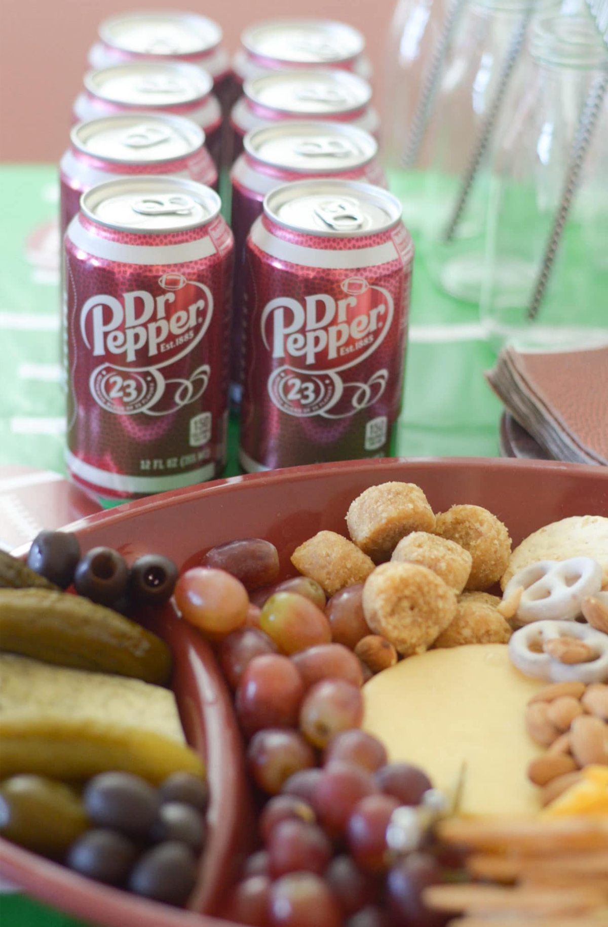 This football themed board by Mommy Hates Cooking is full of crackers, fruit, olives and pickles.