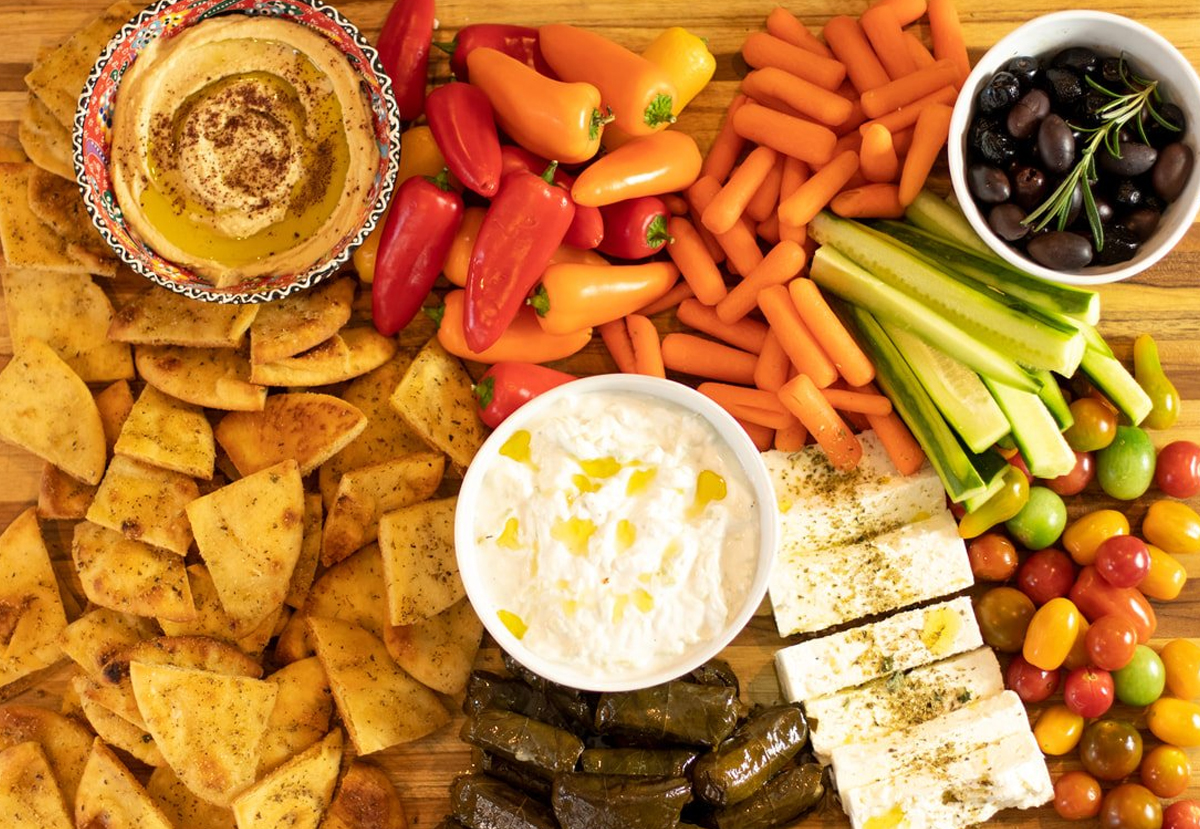 Dimitra's Dishes has a charcuterie board with veggies, pita bread, and dips that is delicious.