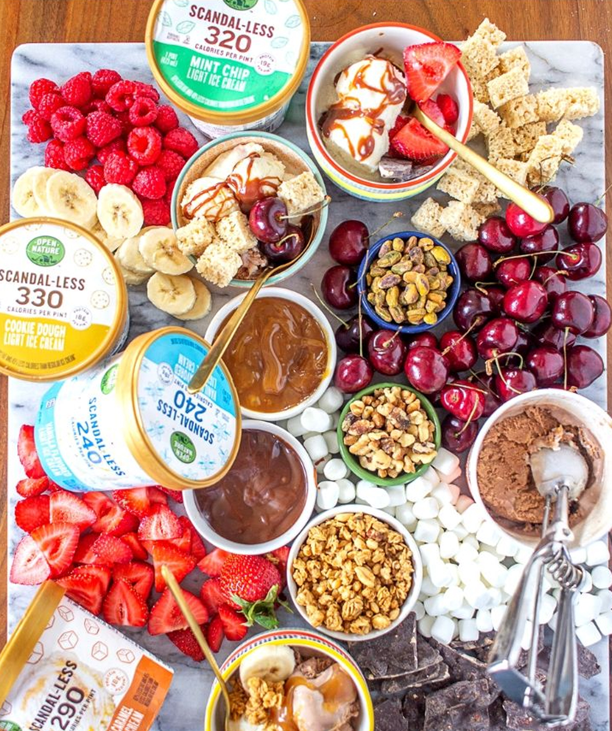 A healthier option with The Kittchen. Plenty of fresh fruit, sauces, mini marshmallows, and nuts.