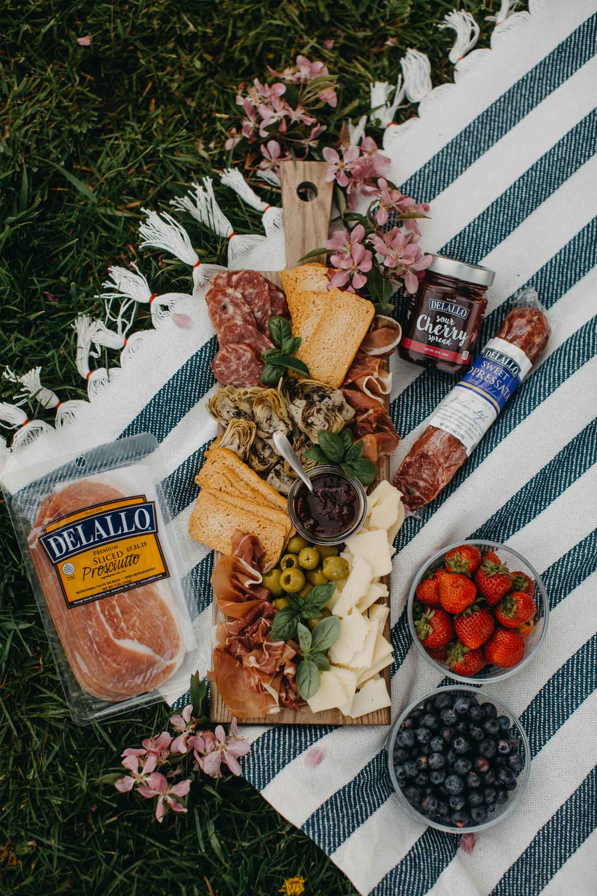 Plays well with butter's charcuterie board with meat, cheese, and fruit.