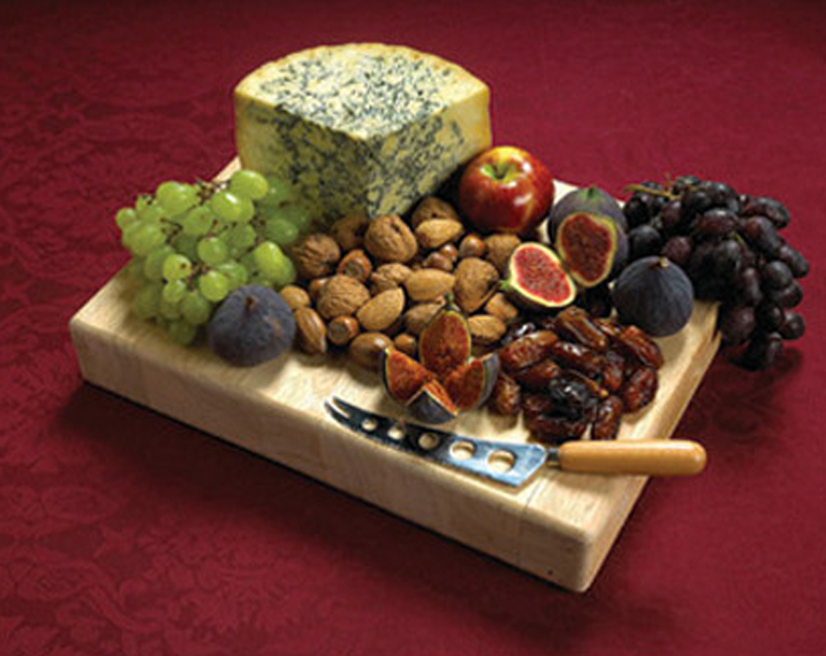Clawson's rustic charcuterie board idea with unique cheese flavors and traditional add-ons.