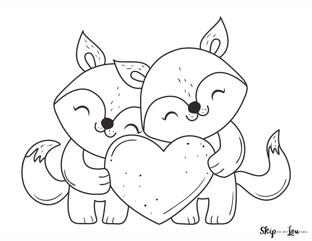 cute foxes holding a heart