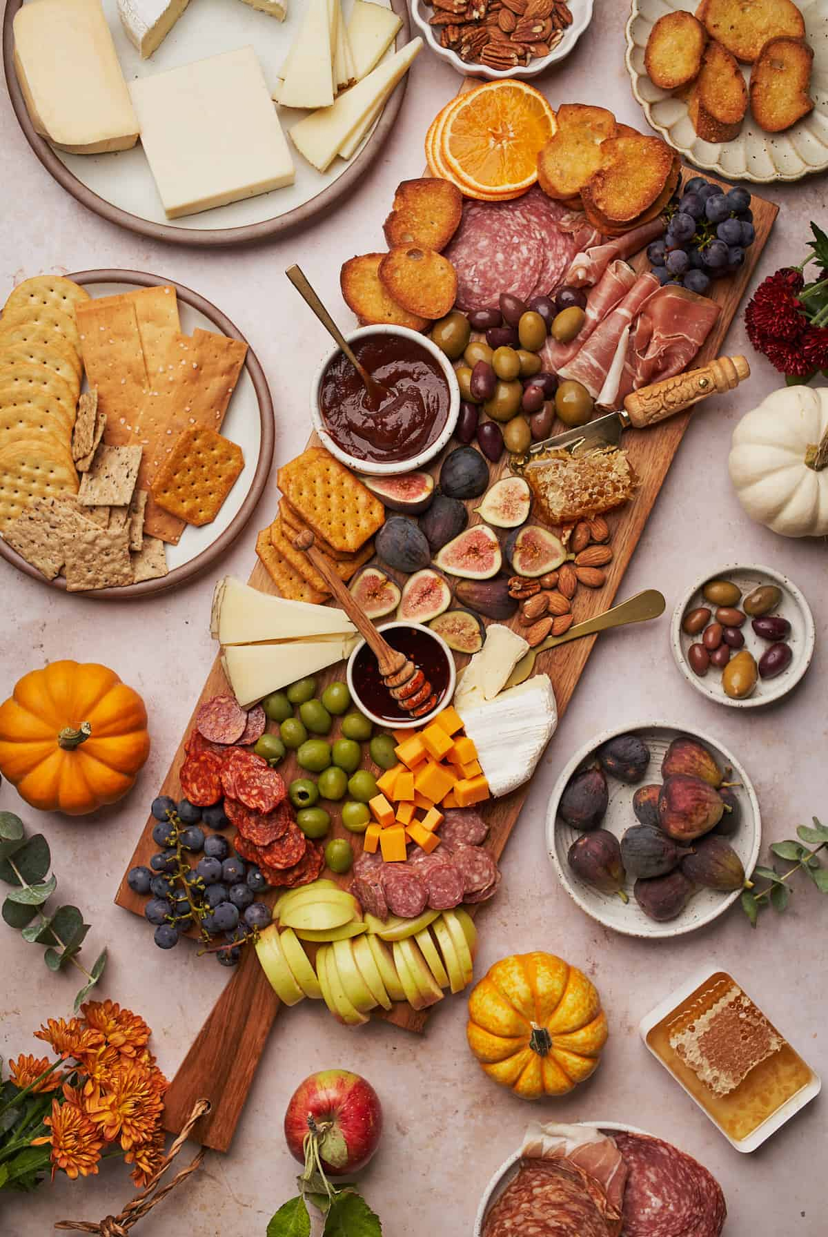 A Full Living includes fresh honeycomb, brie, apple butter, meats, cheese, olives on their fall charcuterie spread.