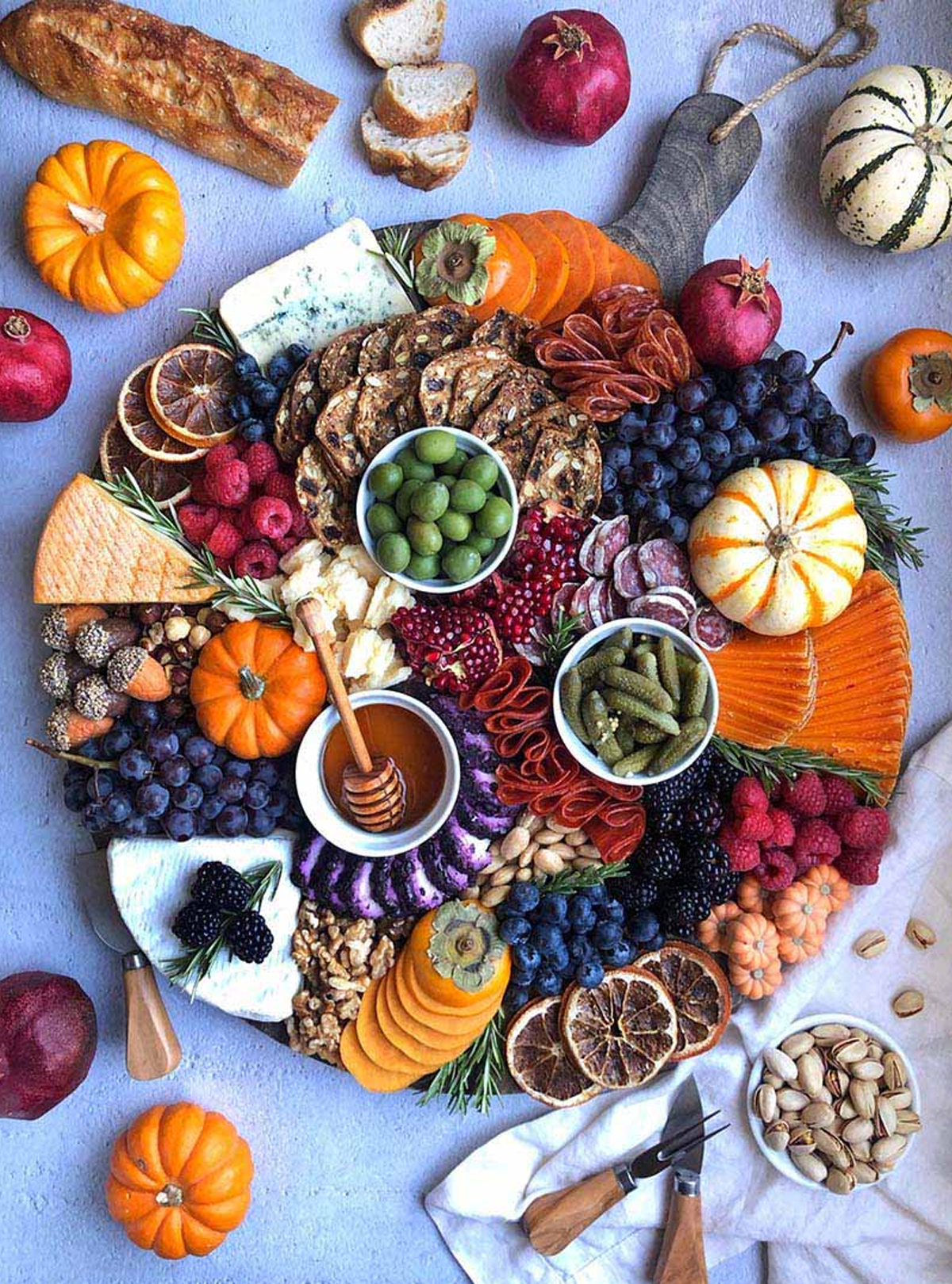 AintTooProudToMeg's has a beautiful board full of fruit, cheese, meat, and nuts.