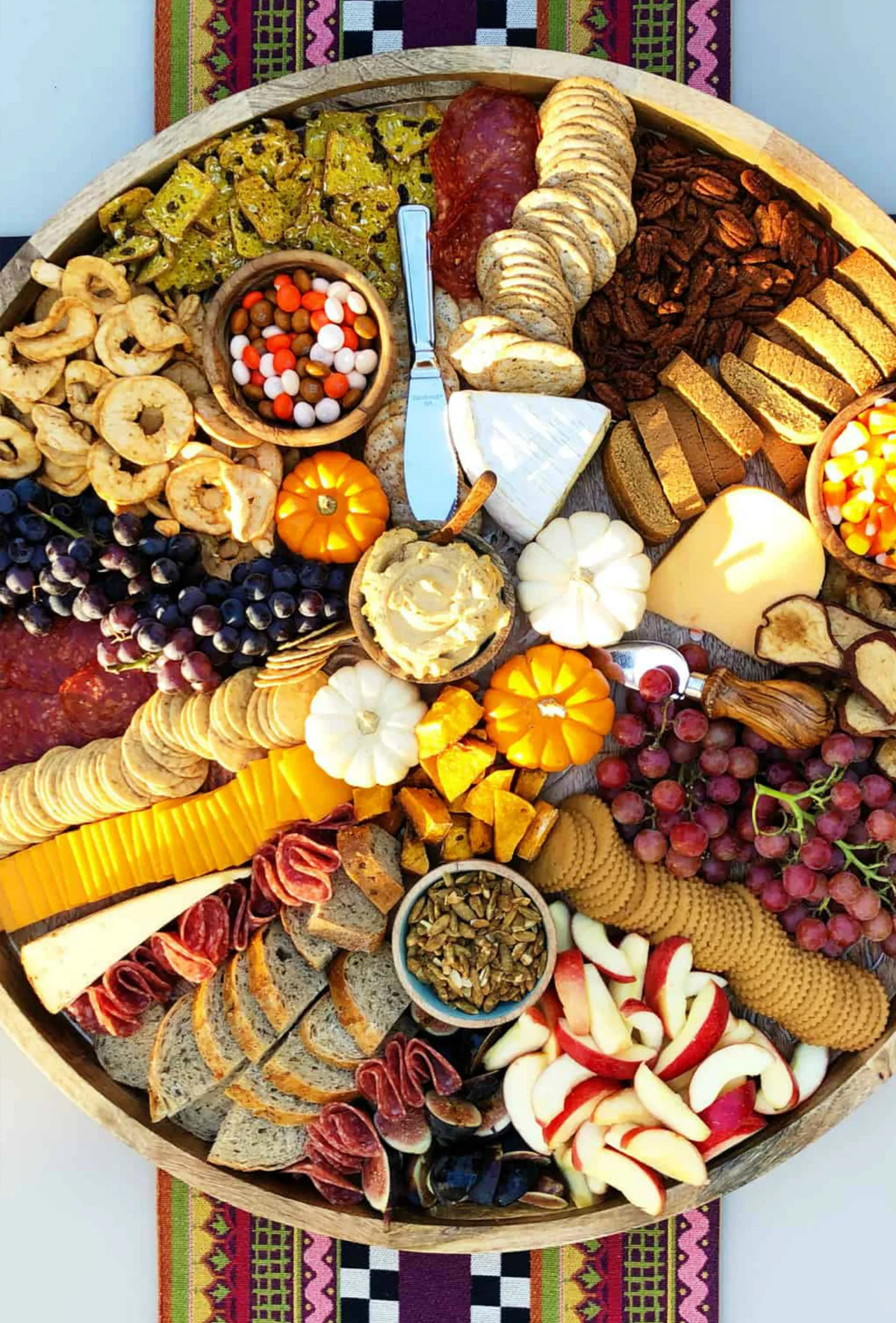 The Reluctant Entertainer's board is full of meats, cheese, seasonal fruits, and nuts!