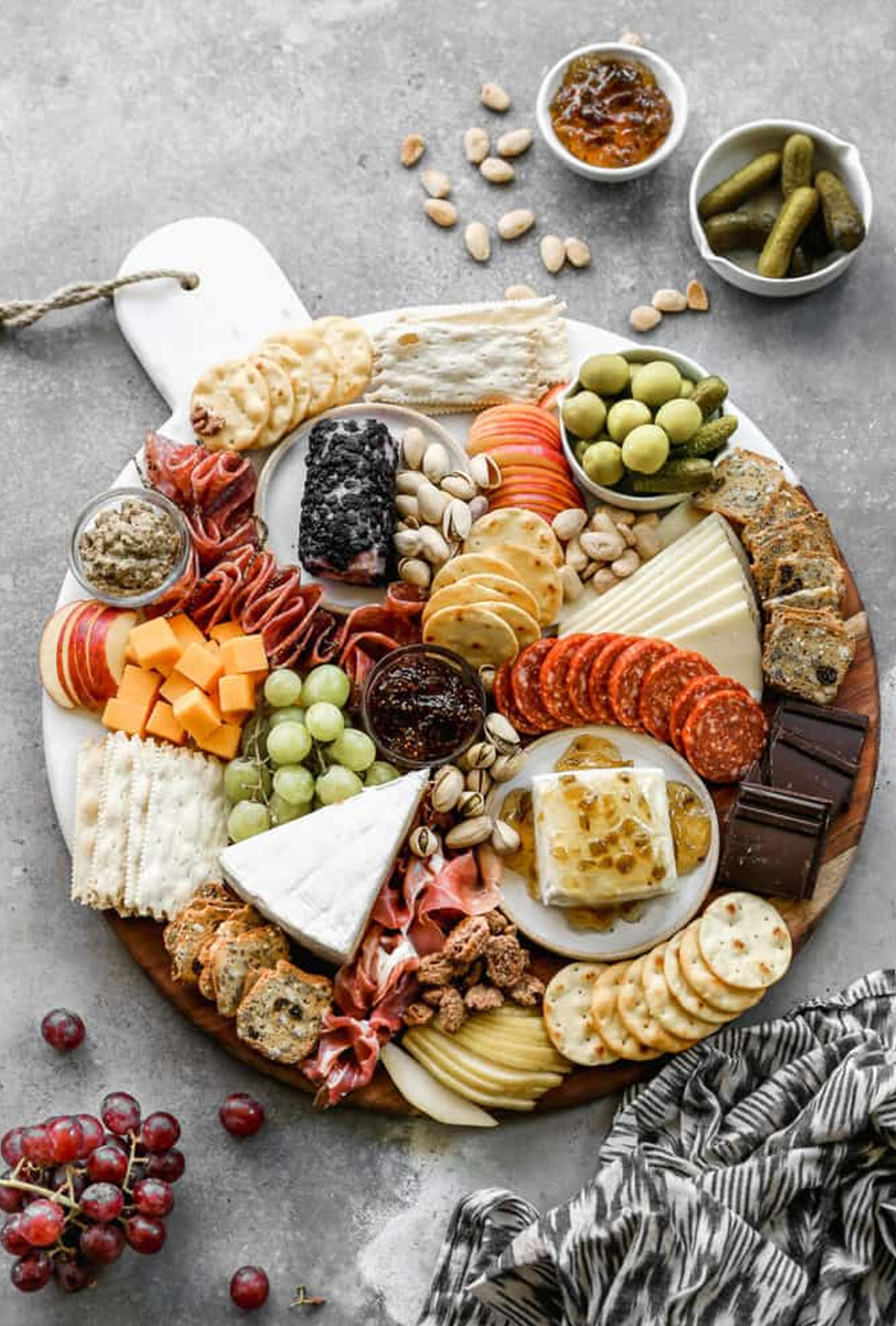 Chocolate, cheese, crackers, fruit, and meat fill Tastes Better From Scratch's autumn board.