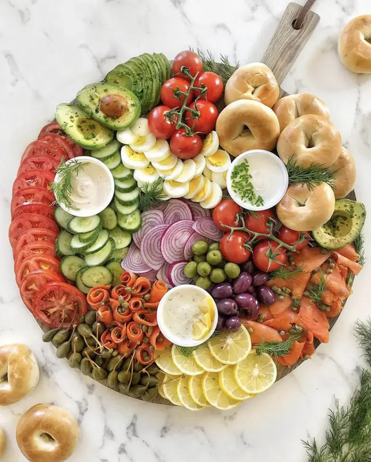 aint to proud o meg has a large board full of options like avocados, tomatoes, hard boiled eggs, olives, lemons, etc.