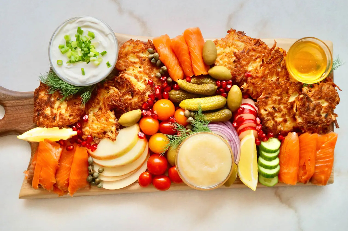 Food network includes veggies, apple sauce, latkes, salmon and more. 