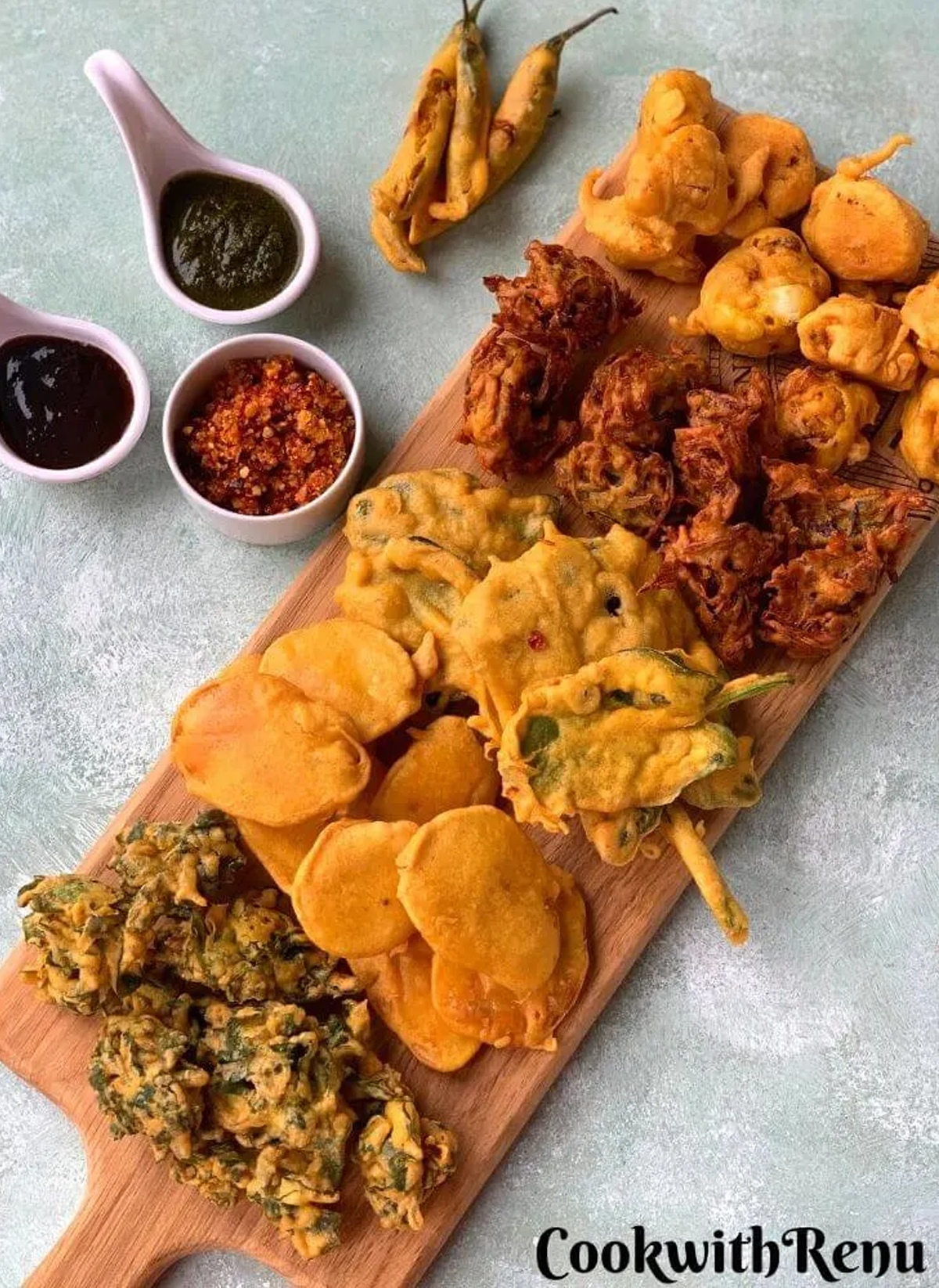 Cook with Renu showcases an assortment of pakoras on this Tea Time Charcuterie Board.