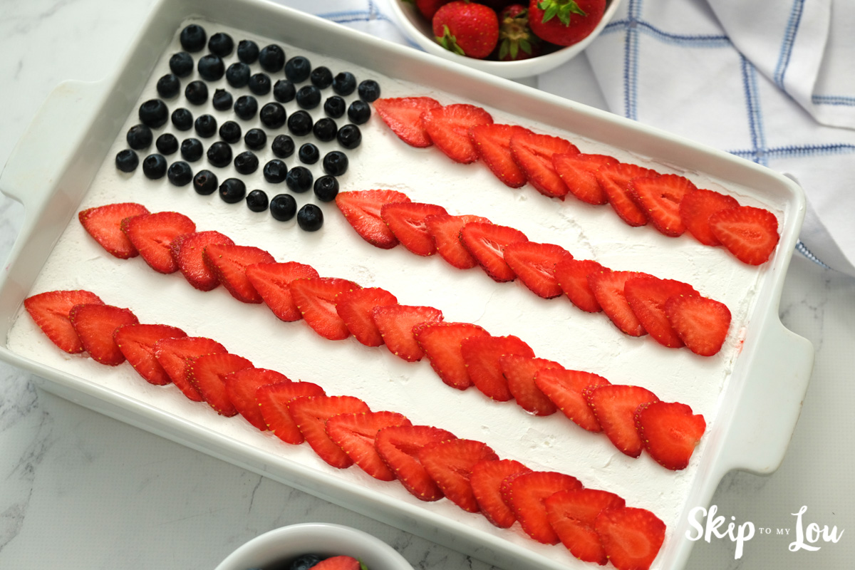 flag cake in white casserole dish
