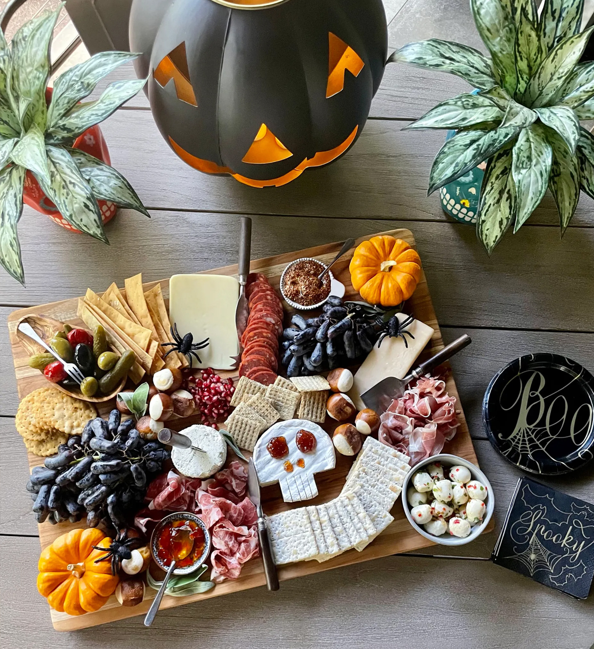 Dialali Cooks Halloween Board presents meats, cheese, fruits, and crackers.