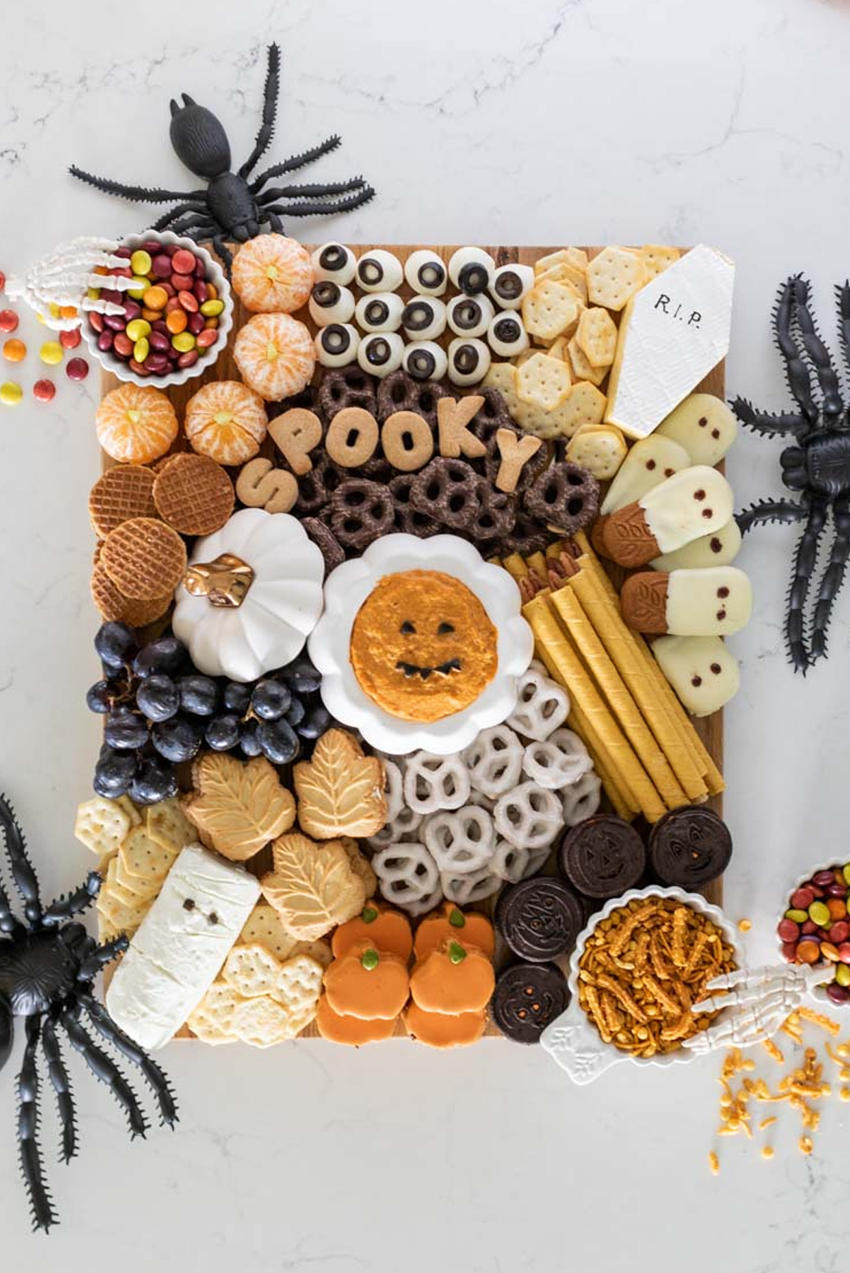 Jennifer Maune's charcuterie board is filled with candy, crackers, cookies, and cheese.