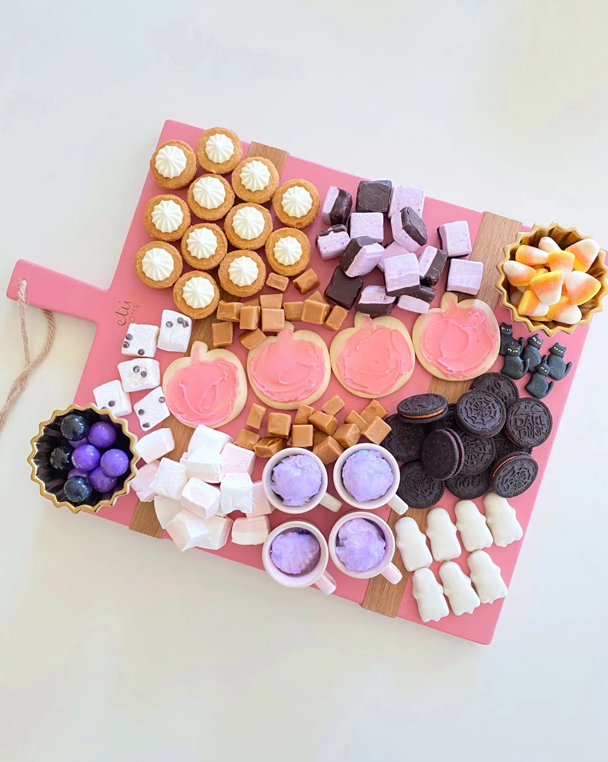 Sugar Color House's boo board shows all types of cookies, and candy.