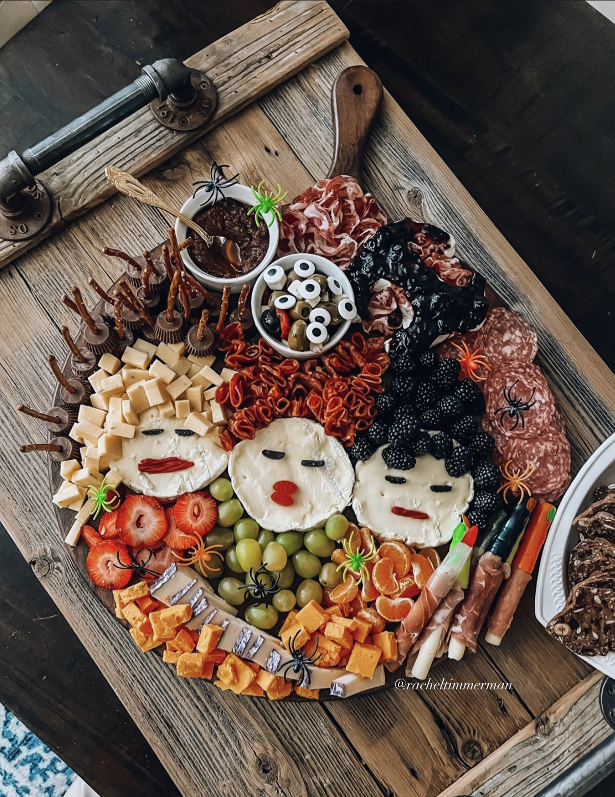 Wine with Paige's Halloween Charcuterie board is full of seasonal meats, cheese, berries, and chocolate.