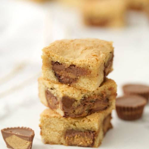 3 Peanut Butter Blondies stacked up and ready to eat, by Skip to my Lou.