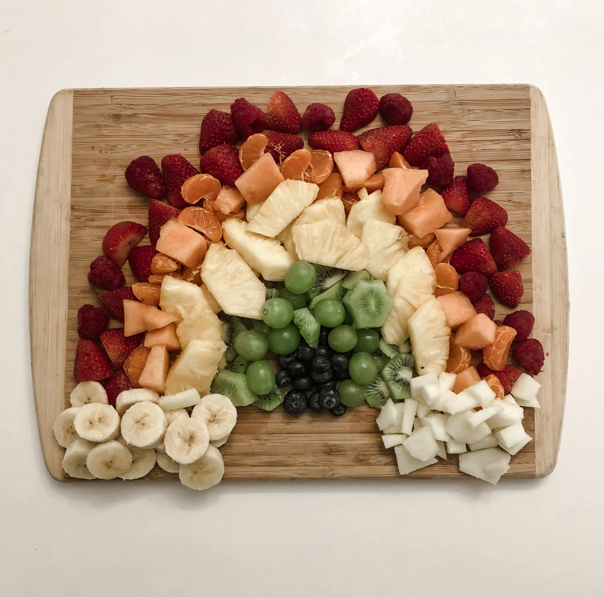 Mama bear wooten's rainbow of strawberries, melon, pineapple, and more.