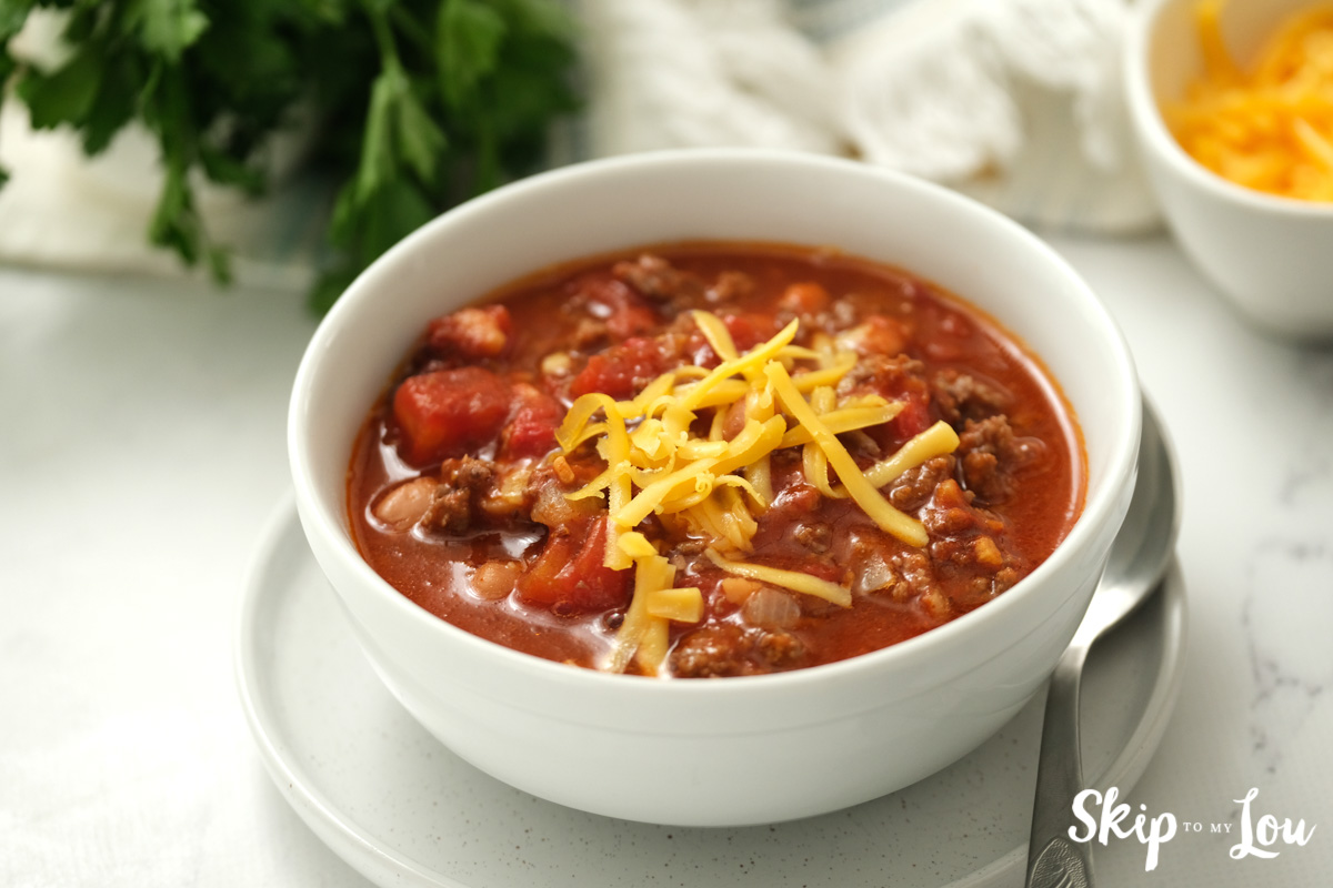 White bowl with Traditional Style slow cooker chili, by Skip to my Lou.