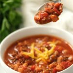 Spoon full of slow cooker chili, by Skip to my Lou.