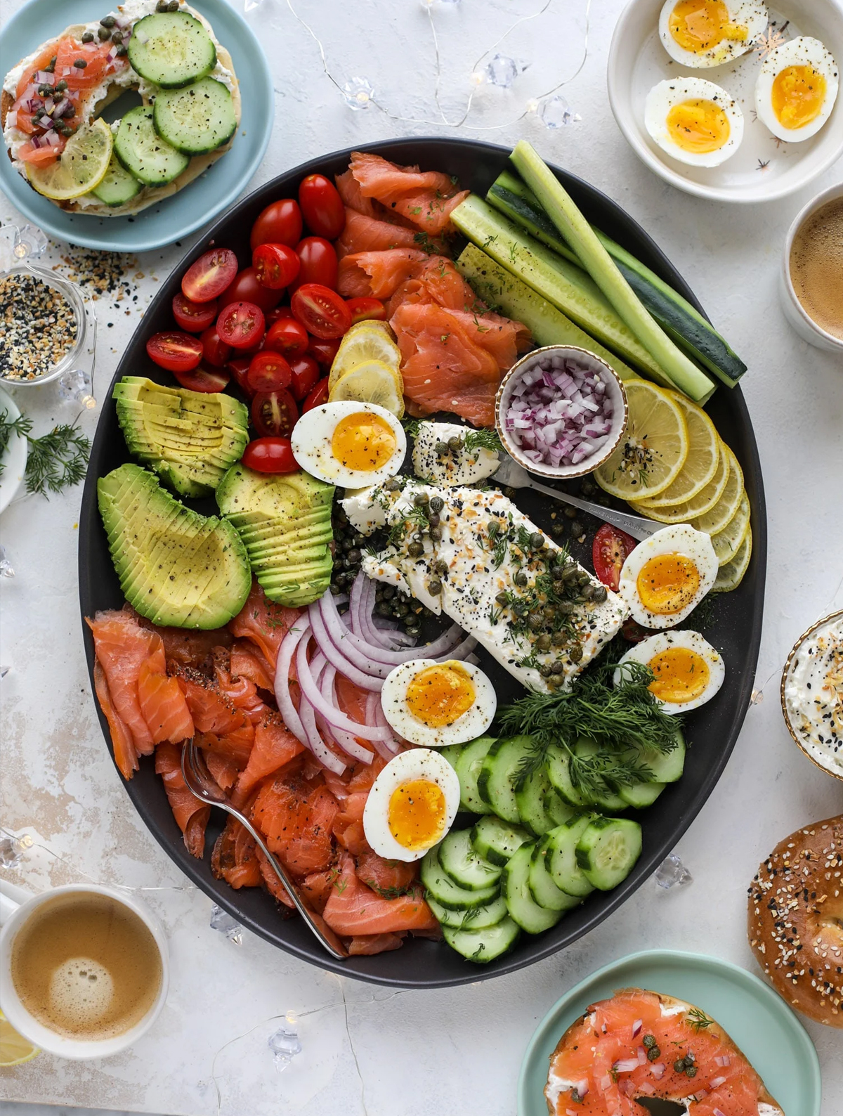How Sweet Eats board showcases eggs, onions, lemons, salmon, cucumber, and avocado.