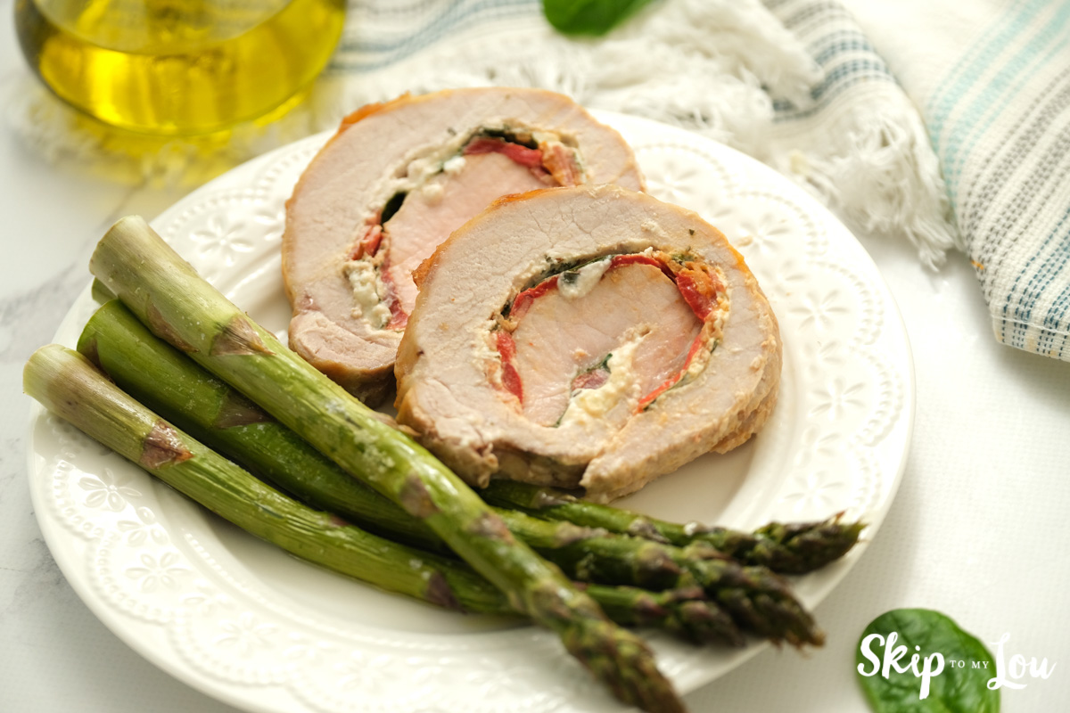 Stuffed pork loin with roasted asparagus, by Skip to my Lou.