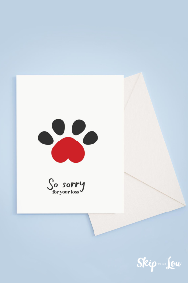 Image shows a pet sympathy card with a heart-shaped paw drawing and text that reads “so sorry for your loss”
