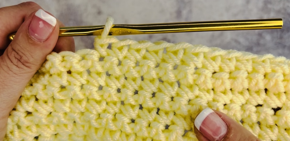 Step 5 to make a stitch crochet. When you reach the end of the row, chain one and turn your work. Continue with the next row.