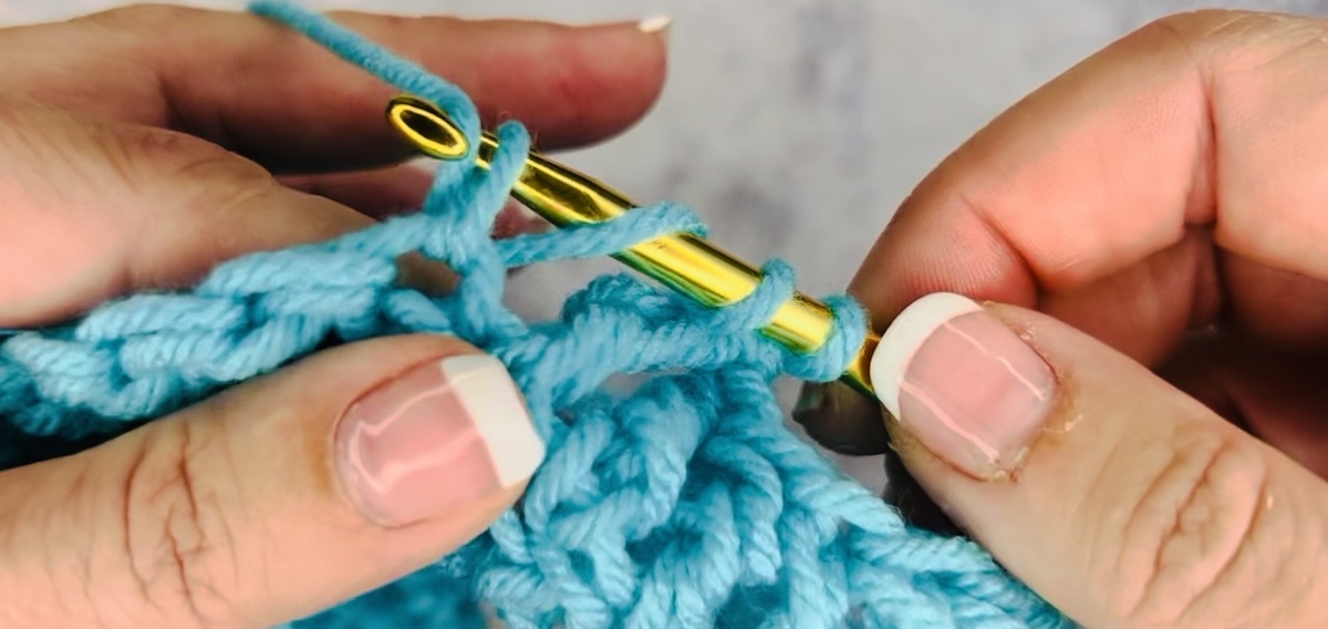 Step 4 to do a treble crochet: yarn over and pull through