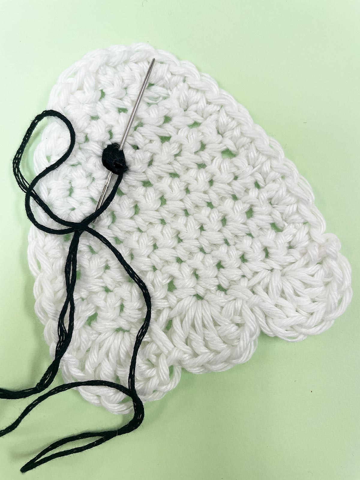 Step 11 to make a crochet ghost