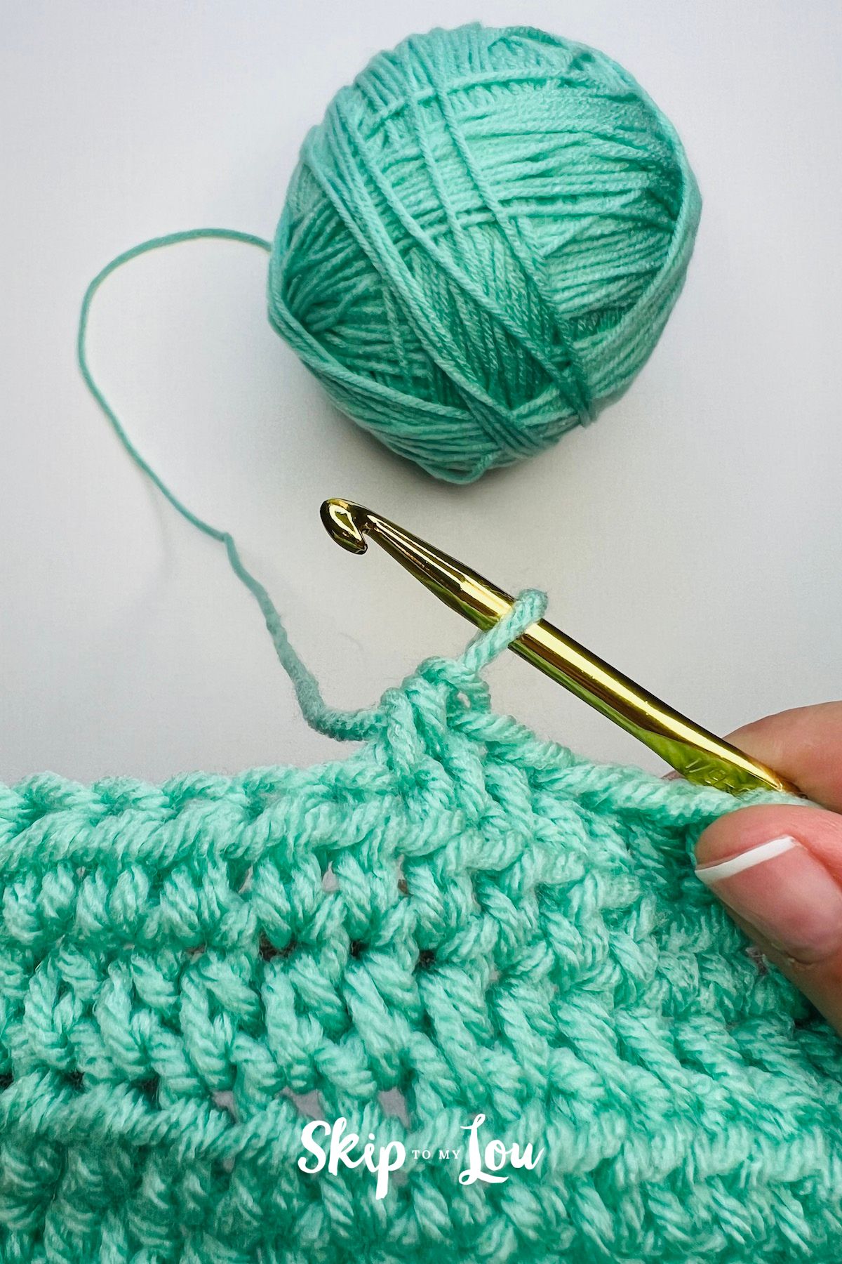Final result of a half double crochet done with green yarn. - Skip to my Lou