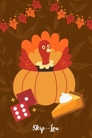 Drawing of a colorful turkey inside a pumpkin next to a pair of dice, a slice of pumpkin dice on top of a brown background