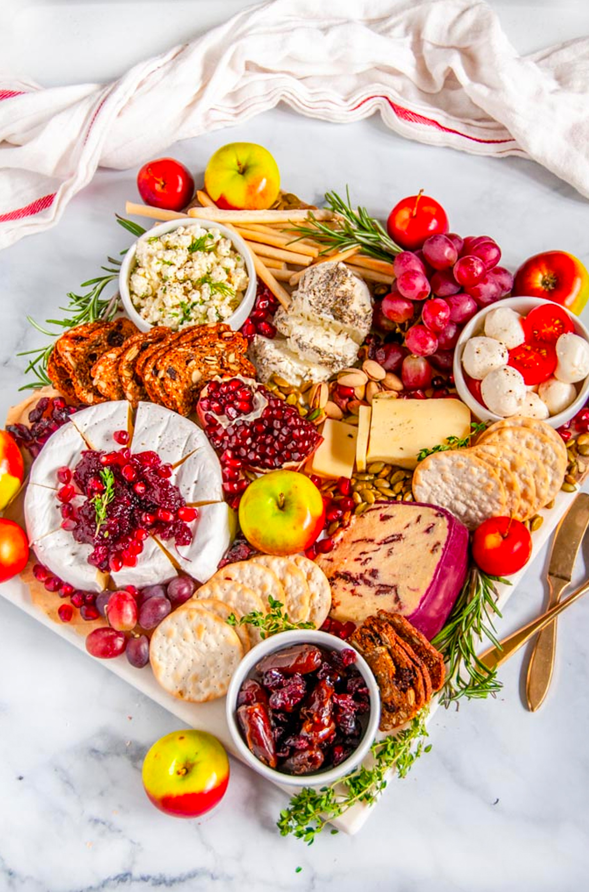 Grapes, tomatoes, mozzarella, cheese, crackers, and seasonal fruit complete Aberdeen's Kitchen winter cheese board.