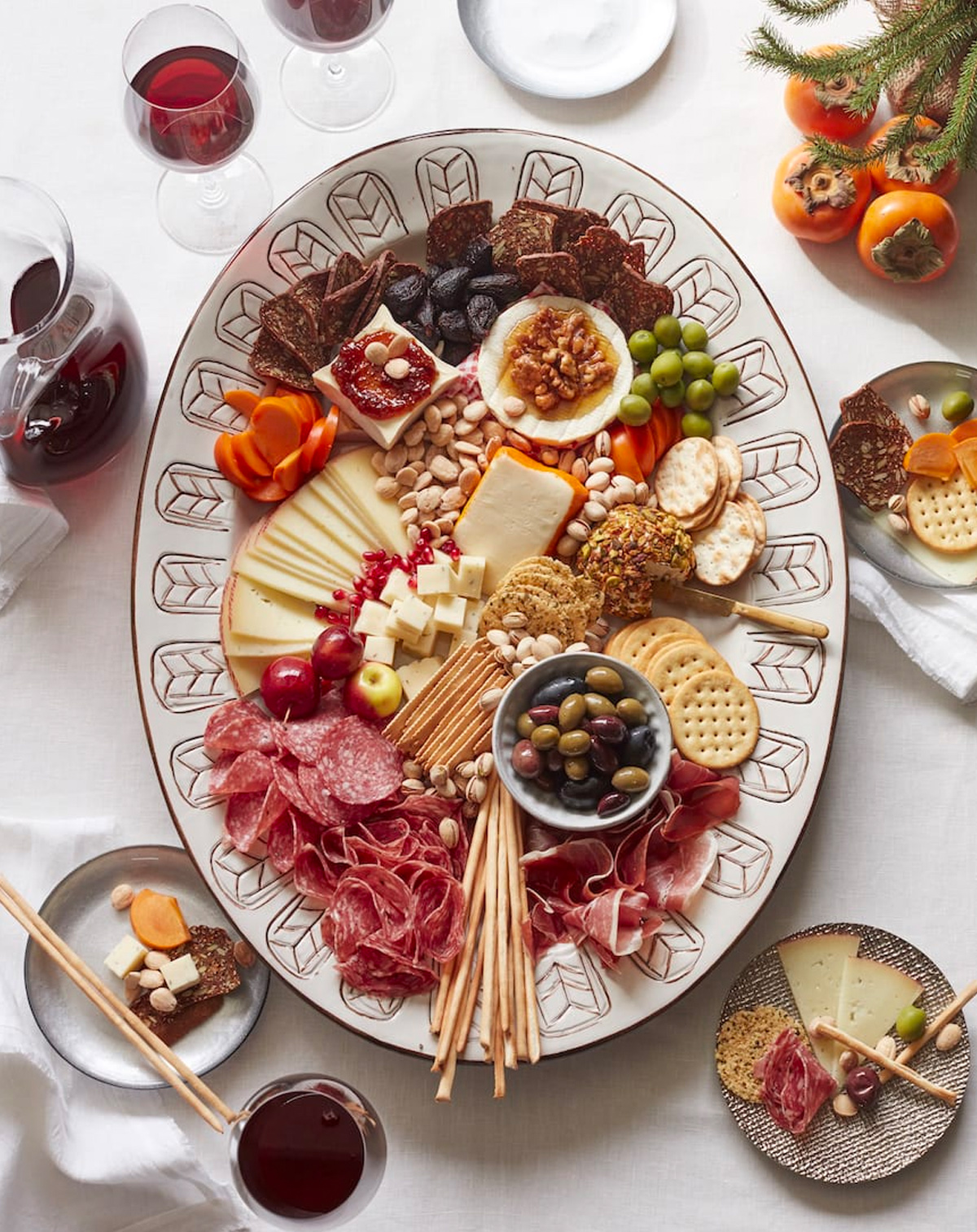Crackers, cheese, nuts, meats, and olives are a part of What's Gaby Cooking's winter board.