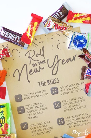free printable roll the dice game with small candies sprinkled around the edge of the game card