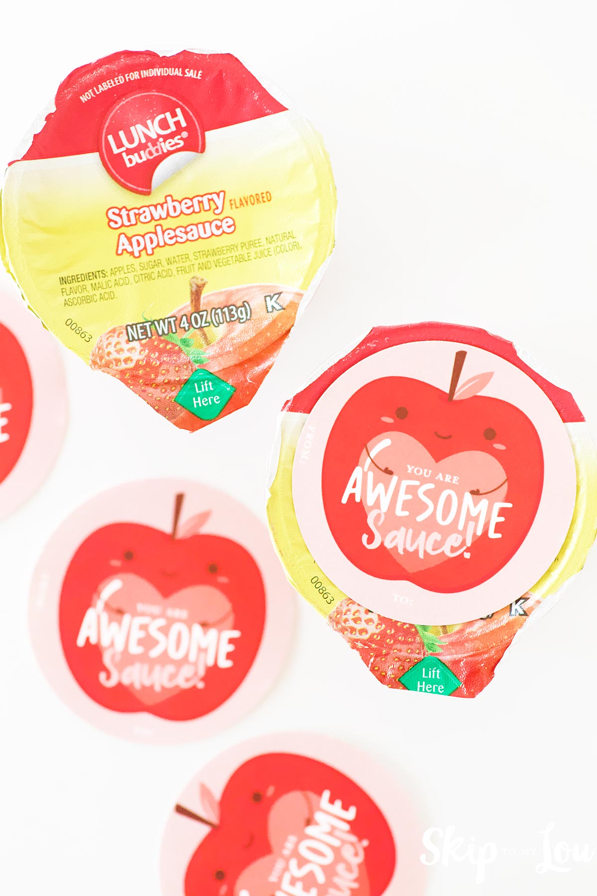 cut circles ready to be placed on top of applesauce cups