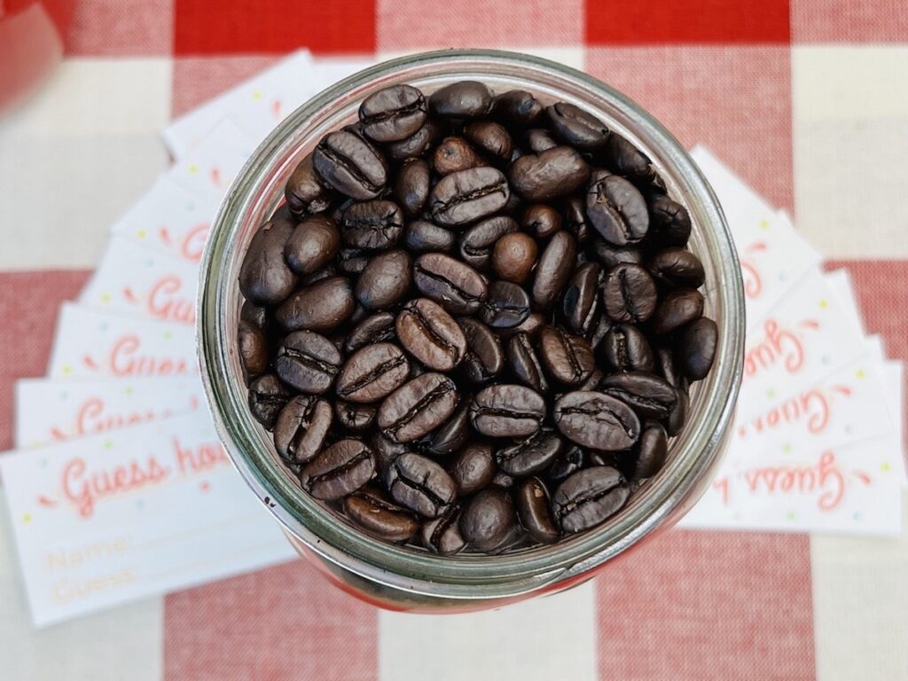 top view coffee beans in a mason jar for the guess how many game