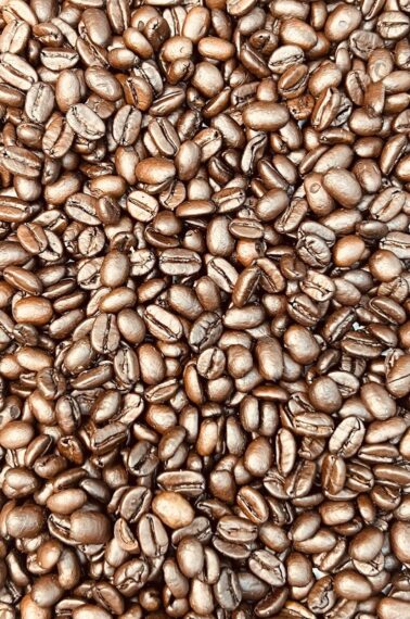 closeup of a big pile of roasted coffee beans for the guess how many in the mason jar game