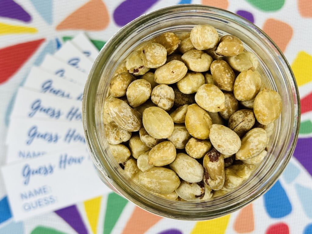 top view peanuts in a mason jar for the guess how many game