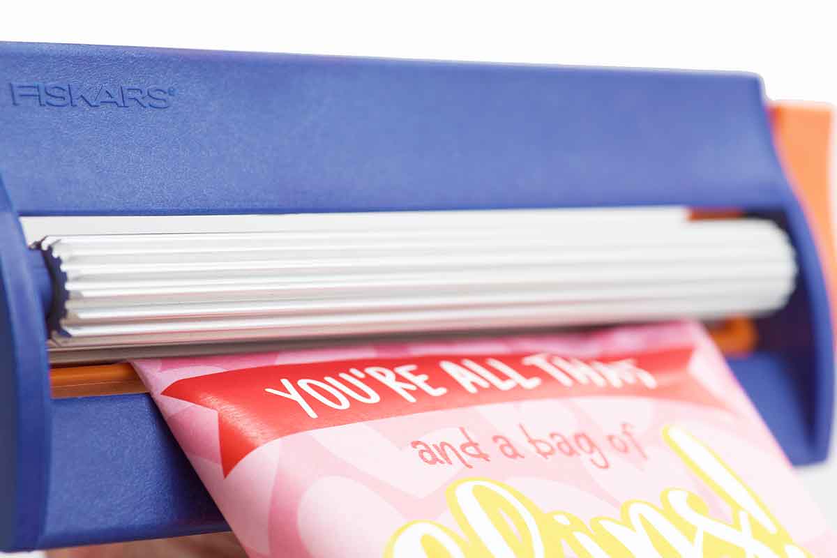 using paper crimper to crimp the ends of the bag