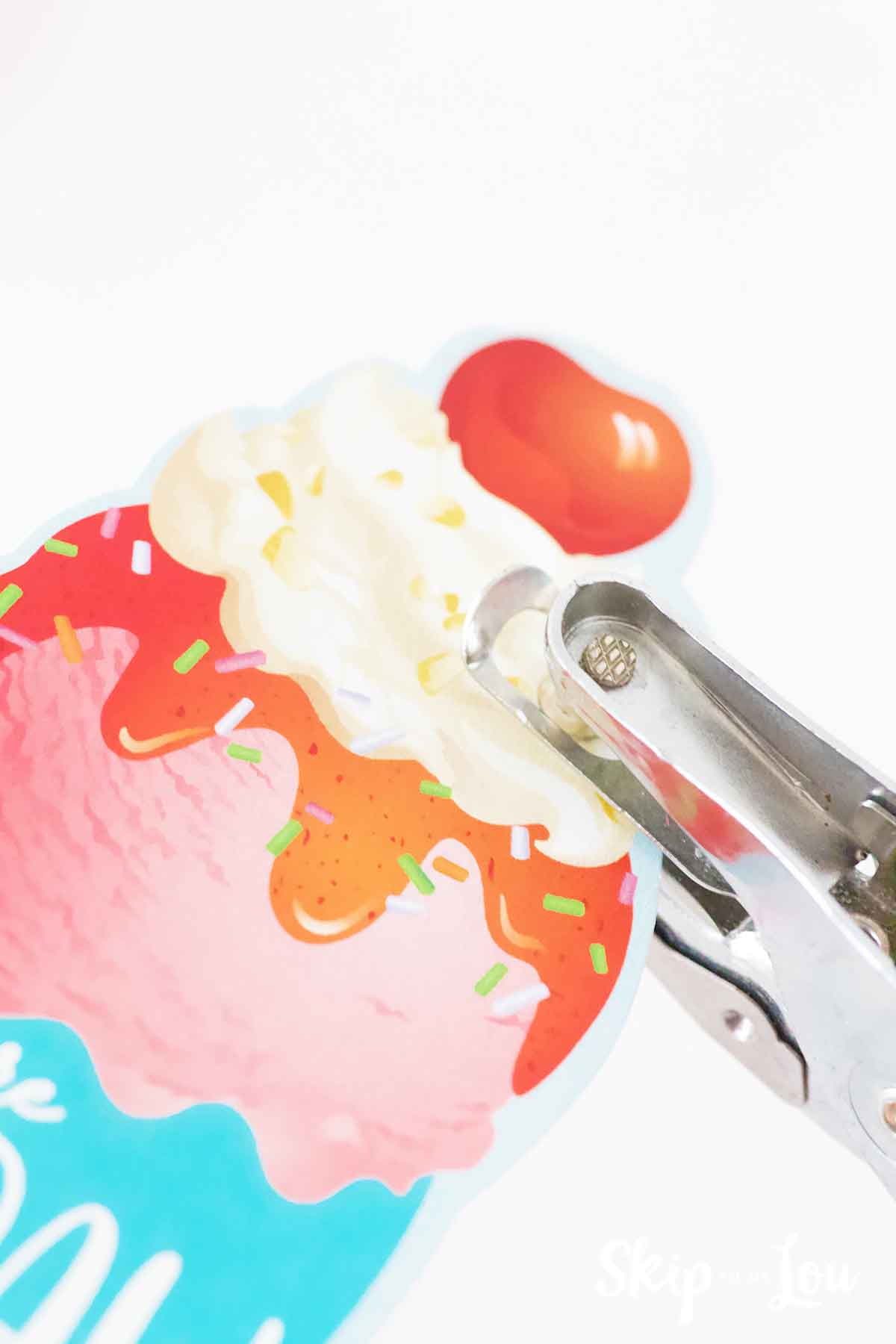 punch hole near top of the sundae