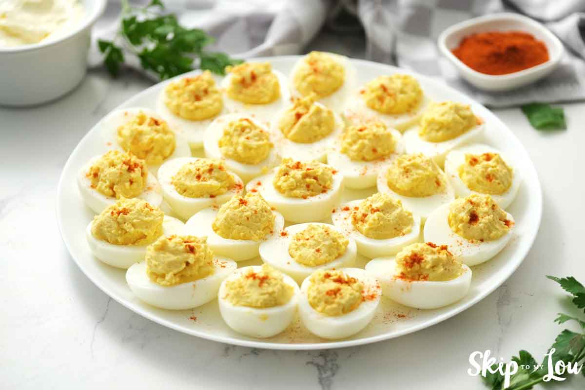 deviled eggs on white platter
