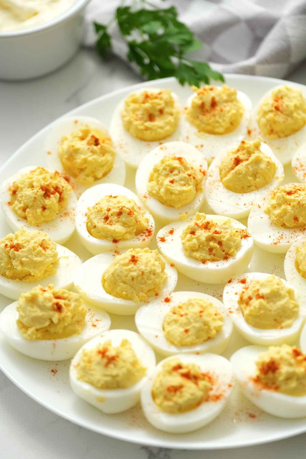 deviled eggs on white platter