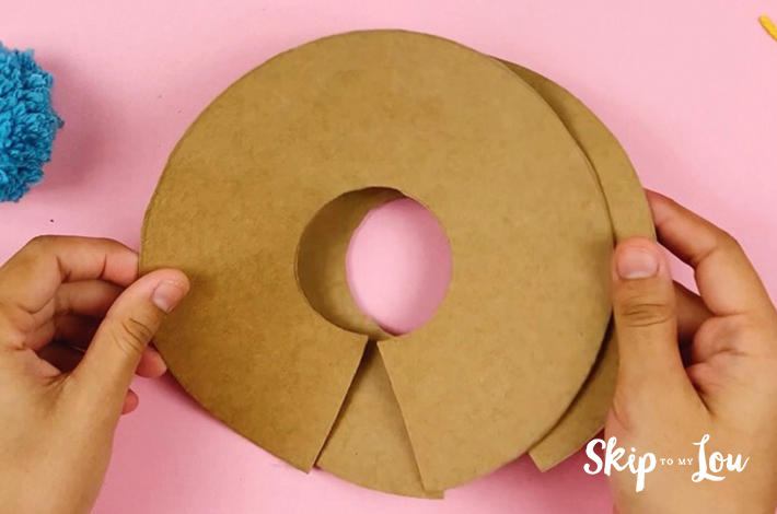 Two cardboard rings that will be used to make pom poms using this method.
