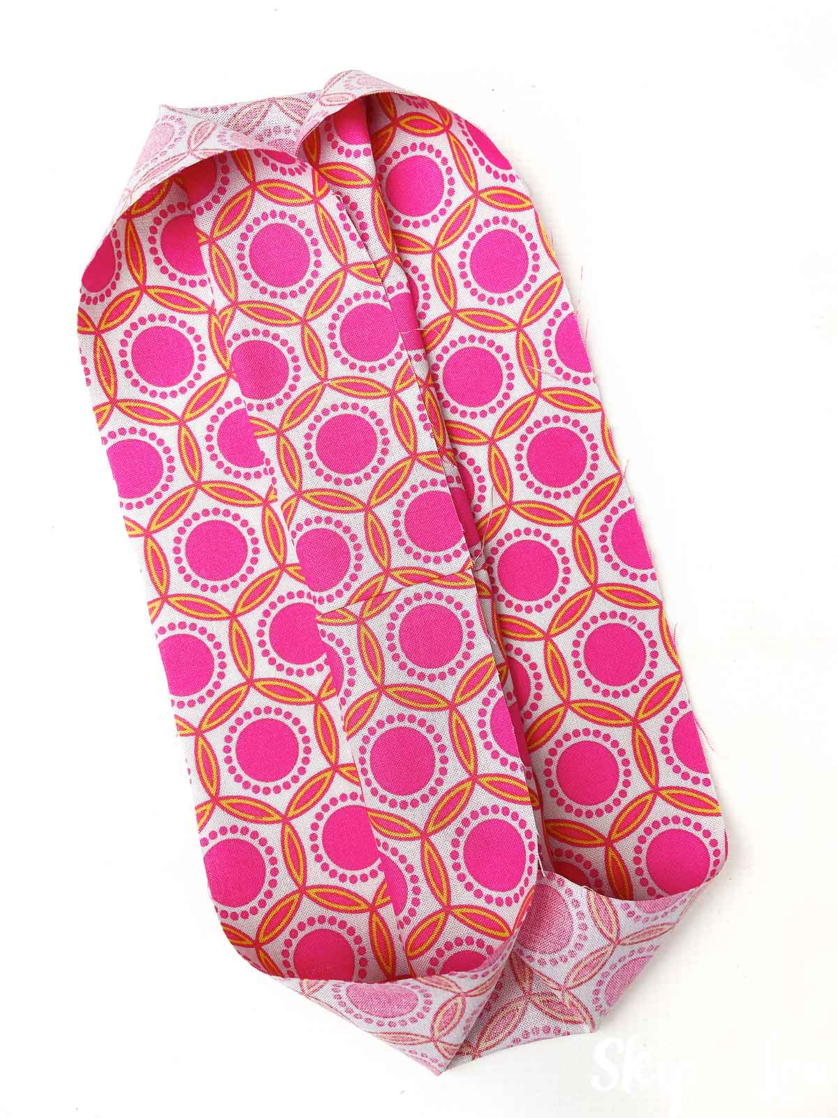 fold each side of the top layer to the center
